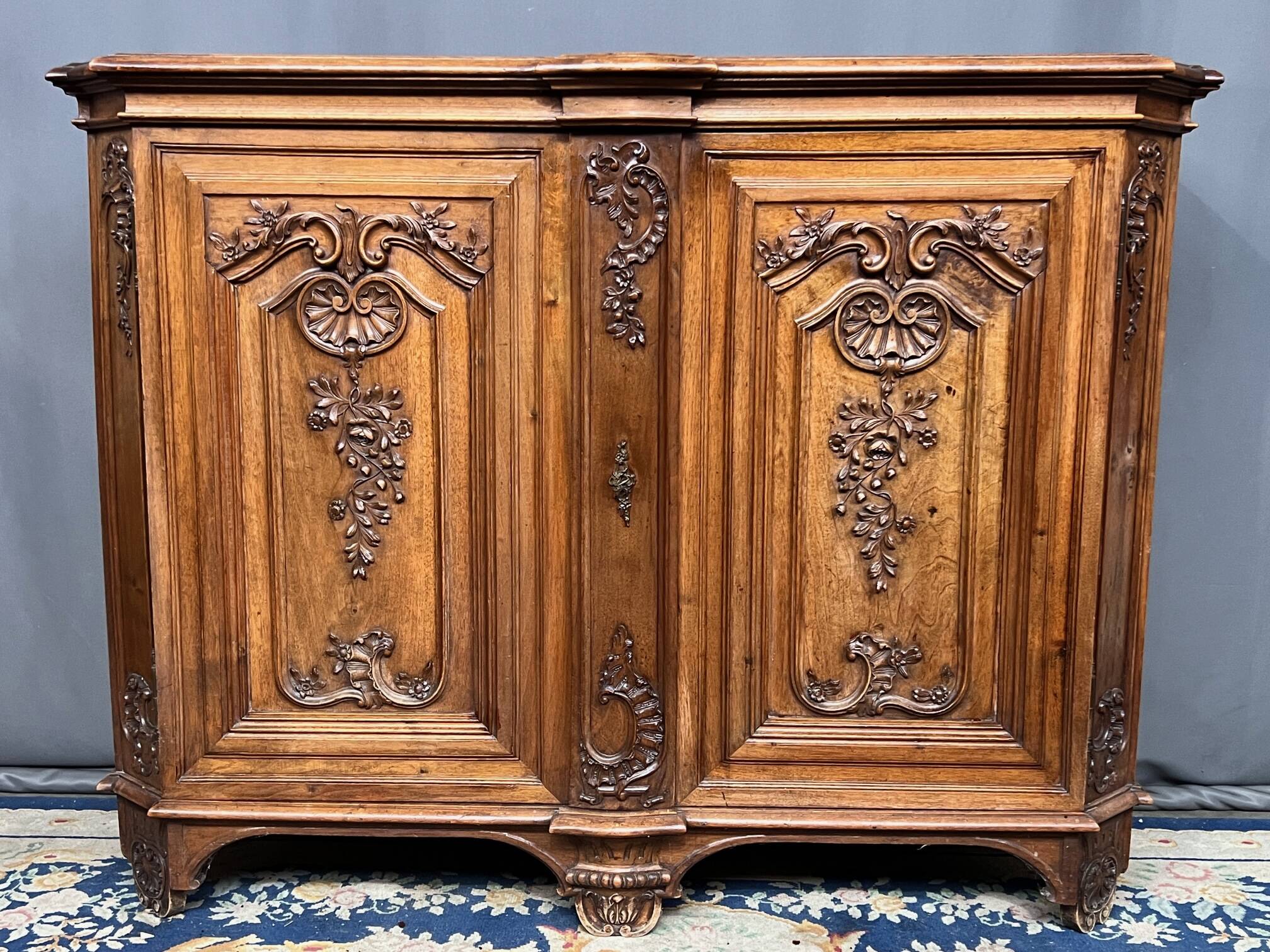 Louis XV style carved walnut chest of drawers