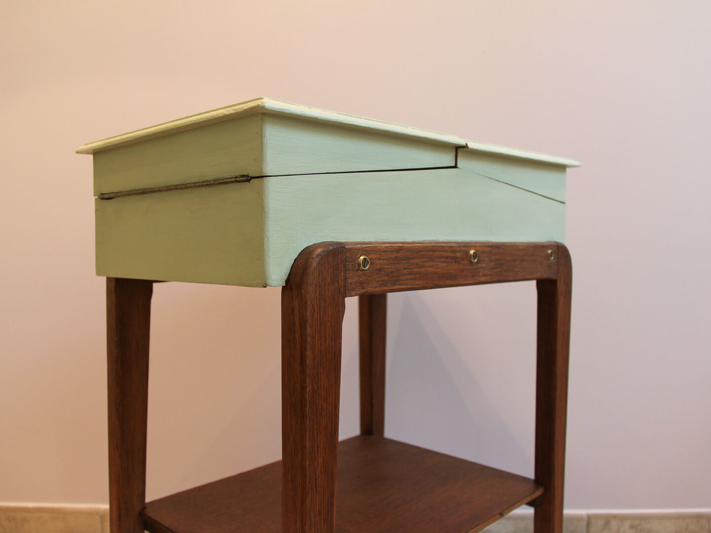 Worker green wood feet wheels