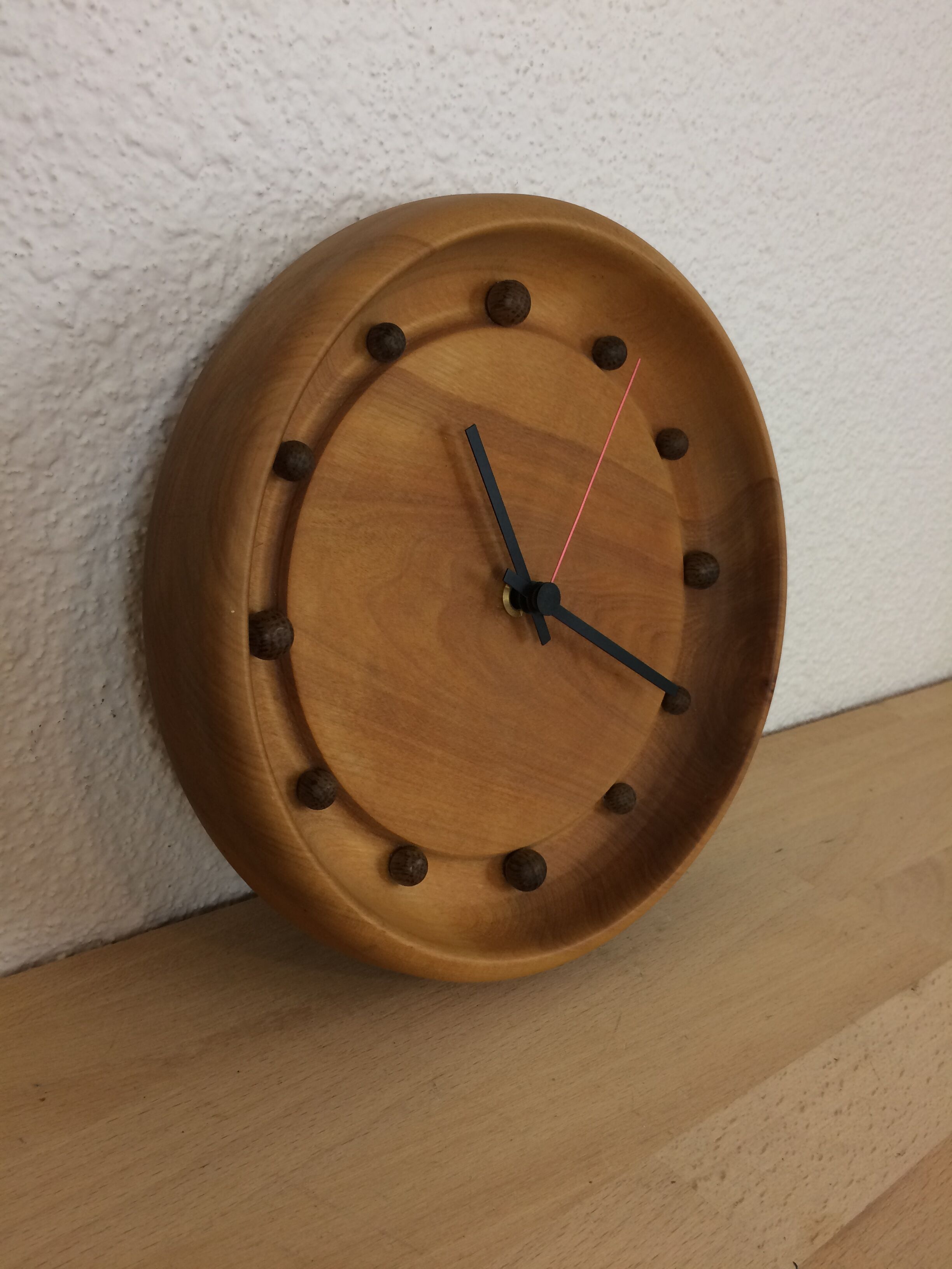 Wall clock in elm wood design