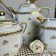 Three-piece tea or coffee service in Limoges porcelain by Singer, years.