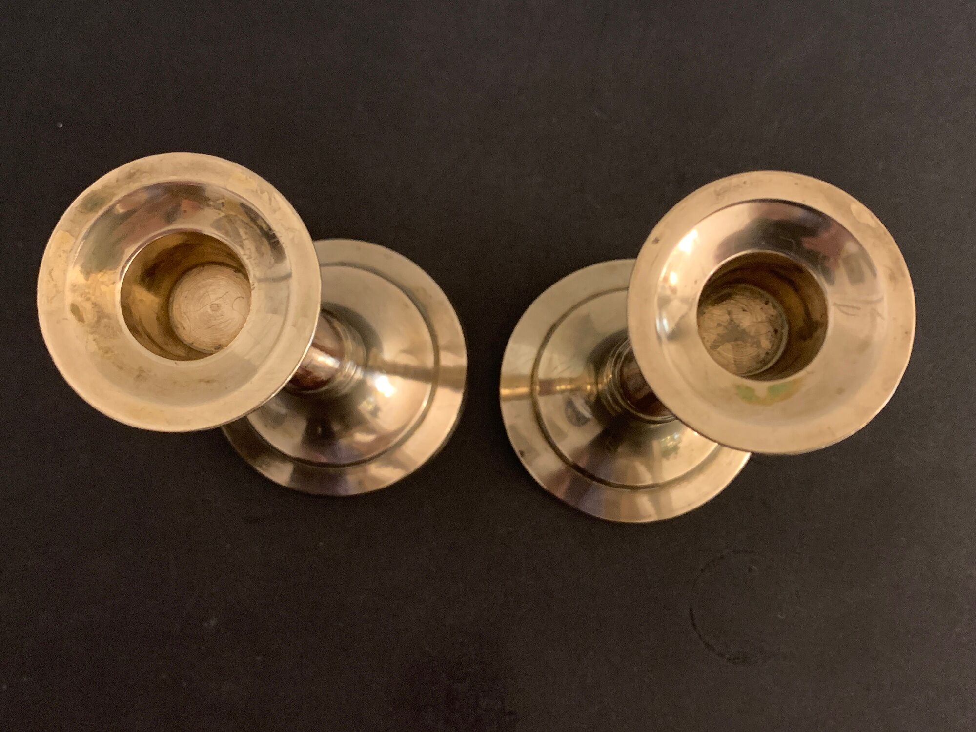 Pair of brass and mahogany wood candle holders