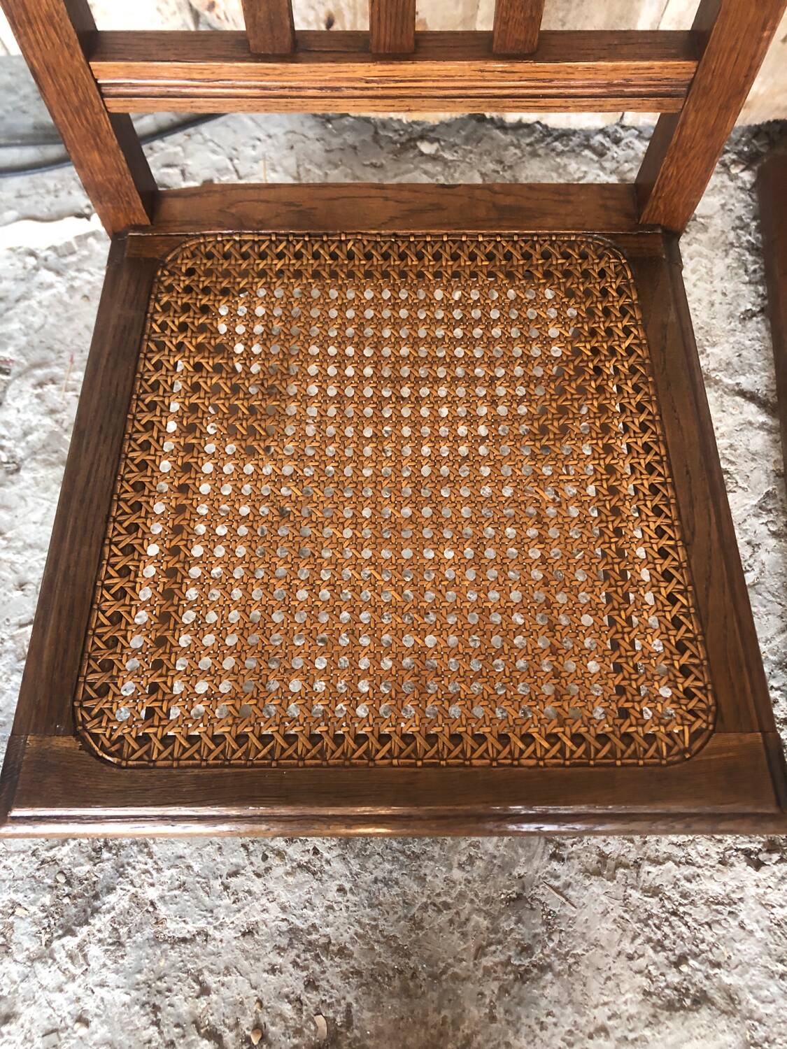 Pair of art deco chairs in wood & cane seat