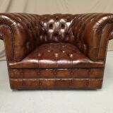 Padded Brown chesterfield armchair