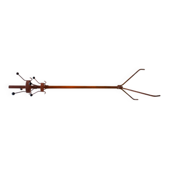 Vintage red industrial coat rack in cast iron, 1950s style, tripod base.