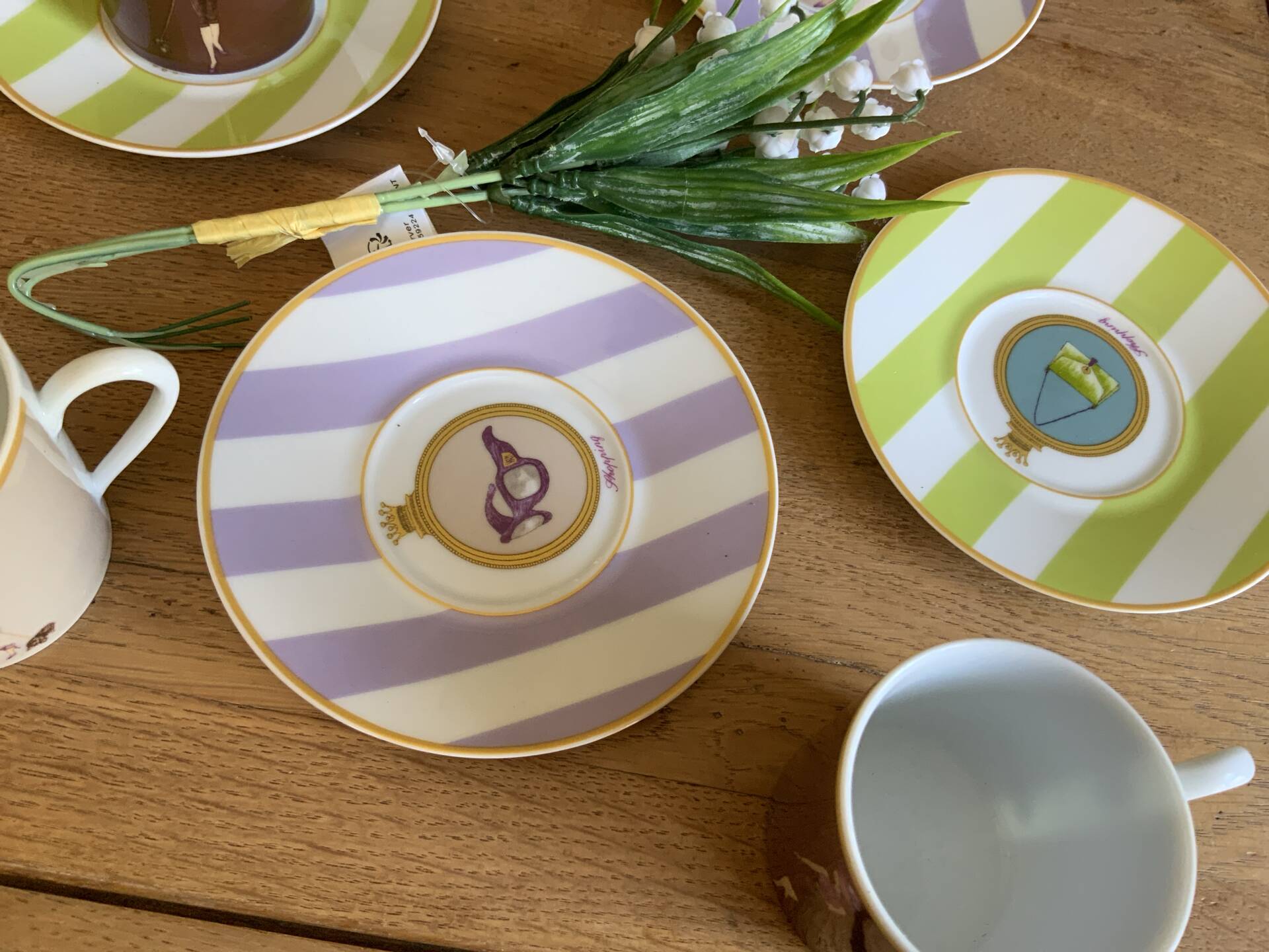 4 cups and saucers porcelain Menard de Noblat - shopping series