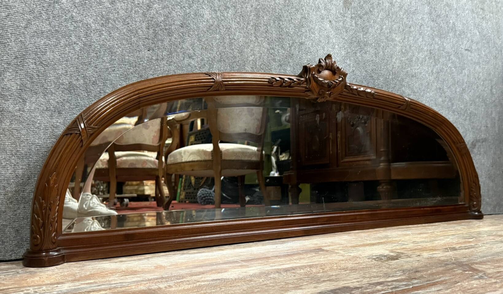 Very large Louis XVI style half-moon mirror in mahogany