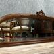 Very large Louis XVI style half-moon mirror in mahogany