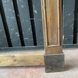 Front or frame or facade of fireplace of the nineteenth century in walnut wood carved by hand.