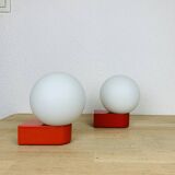 Pair of red Inda space age wall lights, opaline globe, 1970