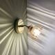 Vintage amber glass globe wall light
