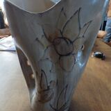 Beige colored vase from the vallauris brand with flower pattern
