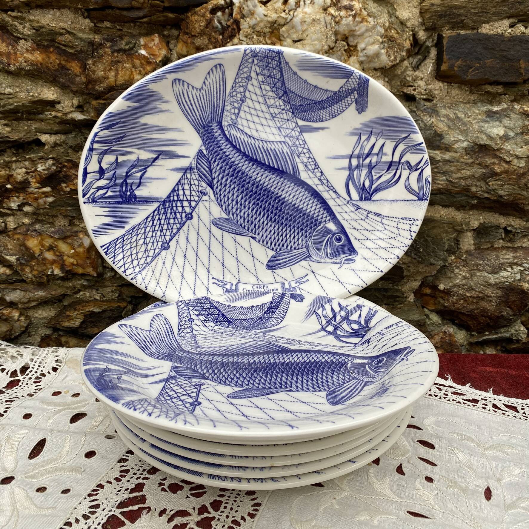 Plates and dish, fish service with cobalt blue decoration.