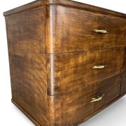 A vintage Italian chest of drawers, made of veneered walnut and solid wood,