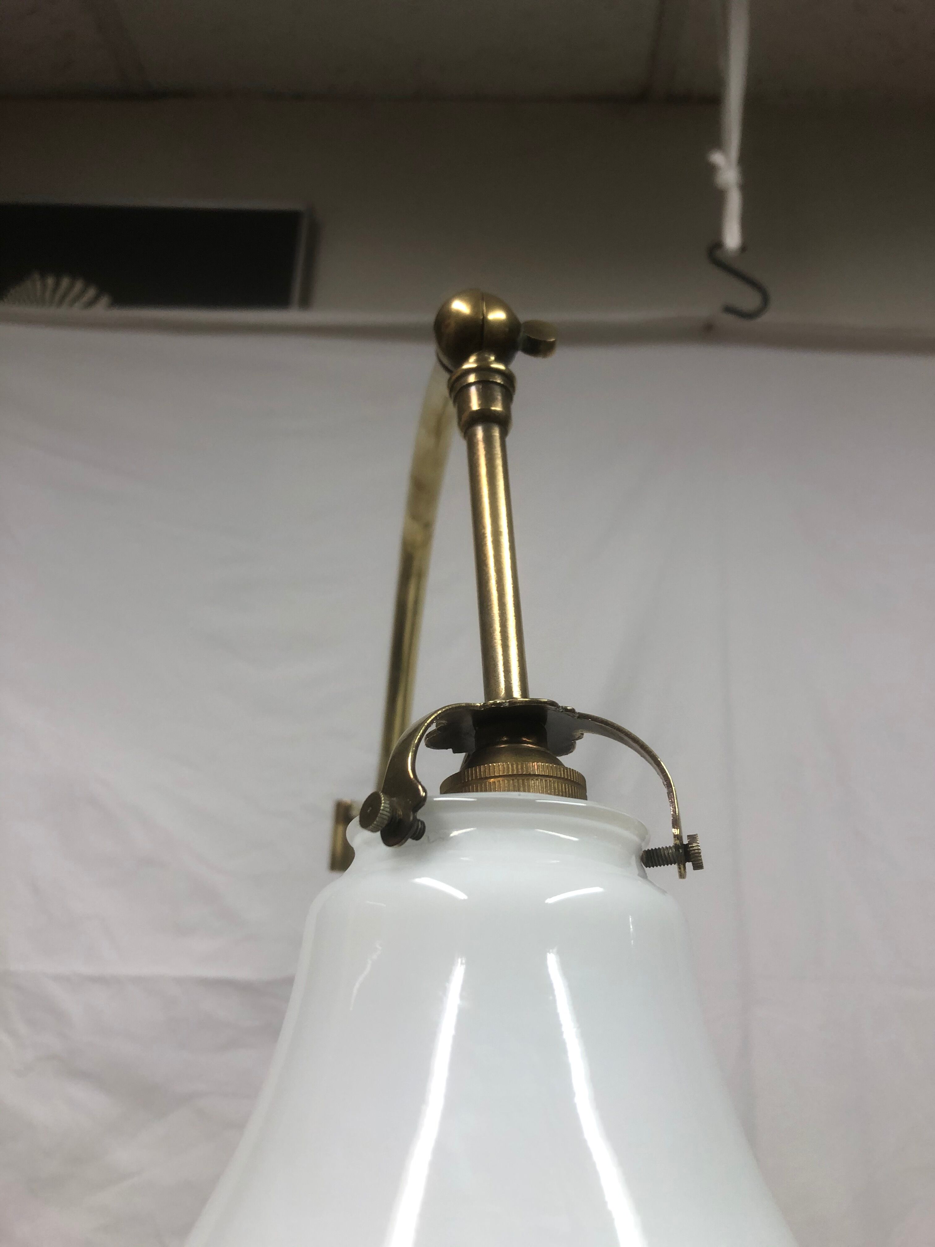 Articulated brass sconce 1950