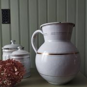 Rare large, pot-bellied toilet jug in white enamelled sheet metal with gold edging
