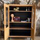 Bookcase in raw wood & metal feet
