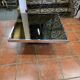 Chrome coffee table with smoked mirror top