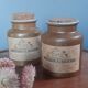 Duo of glazed stoneware mustard pots with label and corks, armand bizouard, amora, 1950