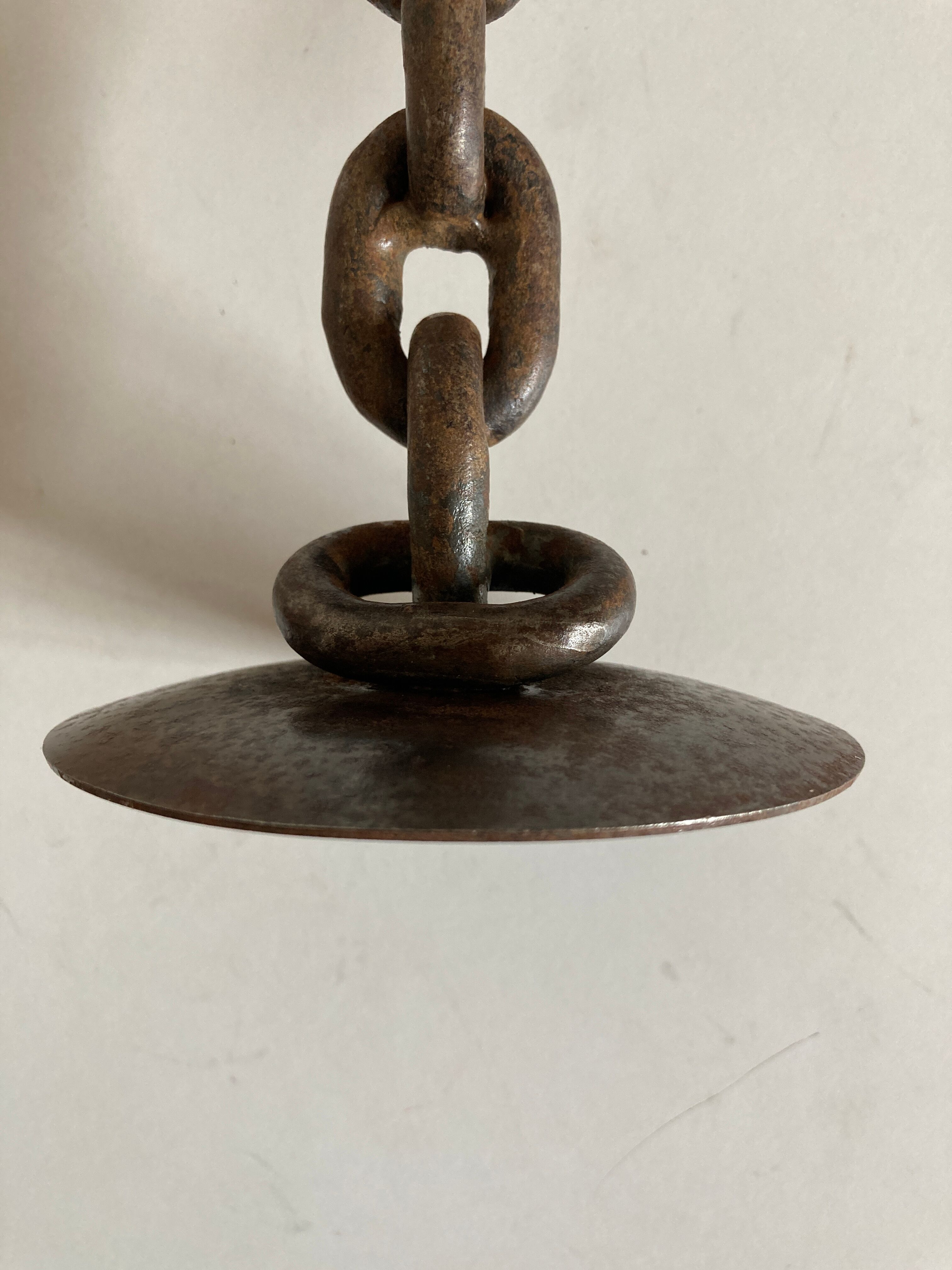 Raw beaten iron candlestick 1970