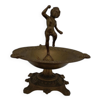 Brass ashtray with cherub decoration.