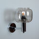 Vintage wall lamp in chromed metal and globe in smoked glass gray design Disderot seventies