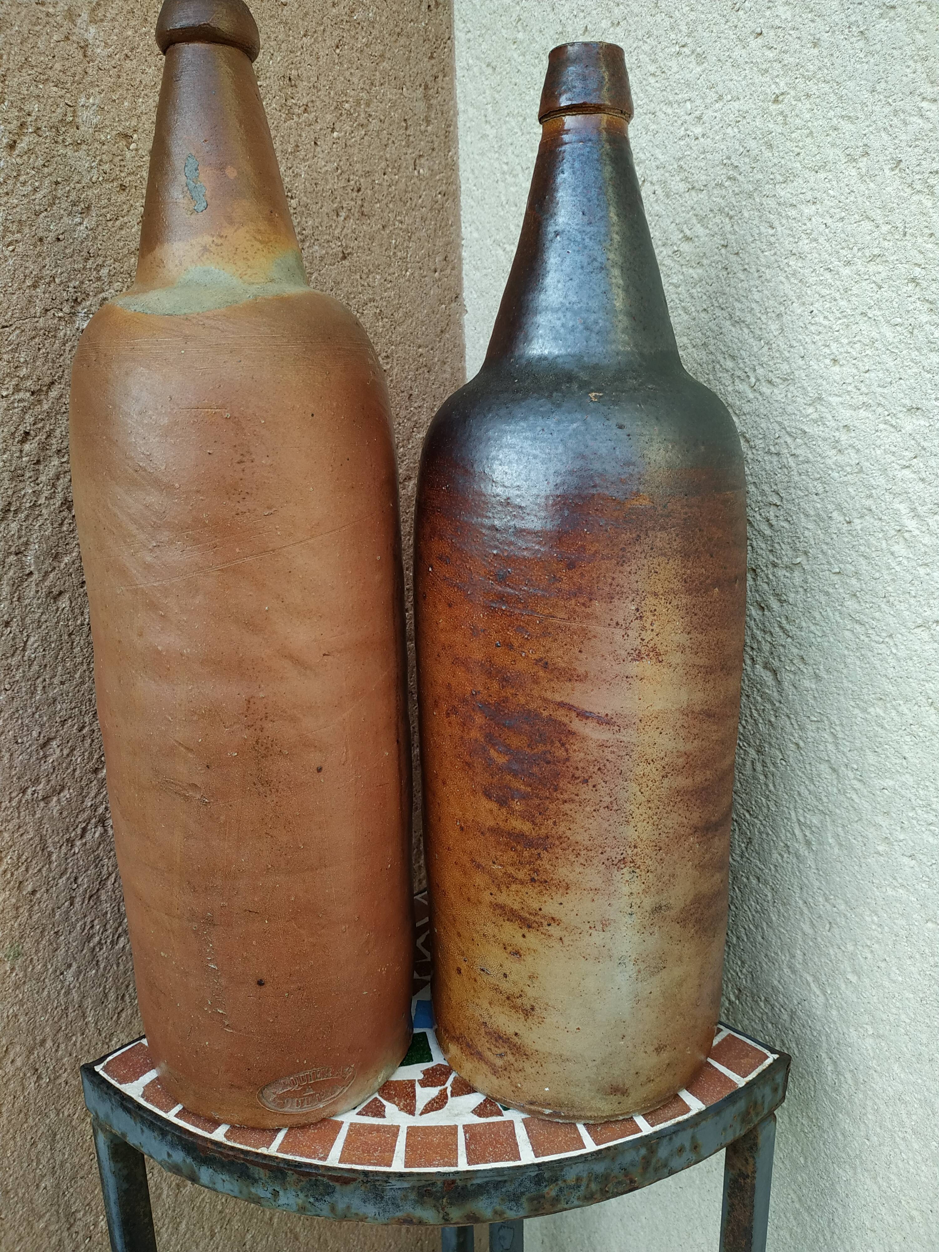Pair of bottles in 19th century breton sandstone