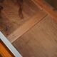 Vintage wooden furniture for 45 wine bottles with a drawer.