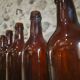 Set of 10 bottles of old Bordeaux French wine in ruby brown glass, 19th century.