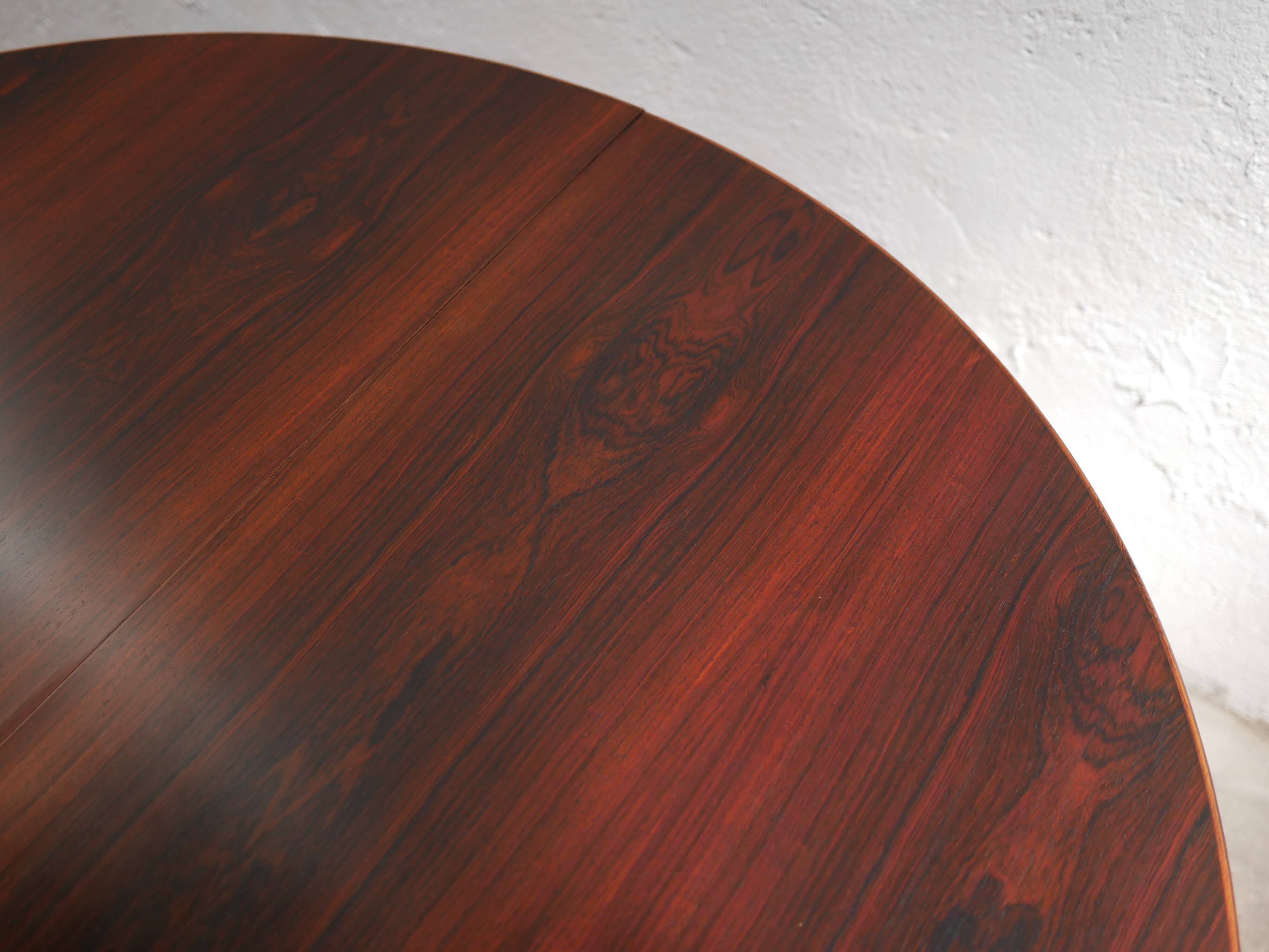 Vintage rosewood extendable Scandinavian round table by Kai Kristiansen for Skovmand and Anders