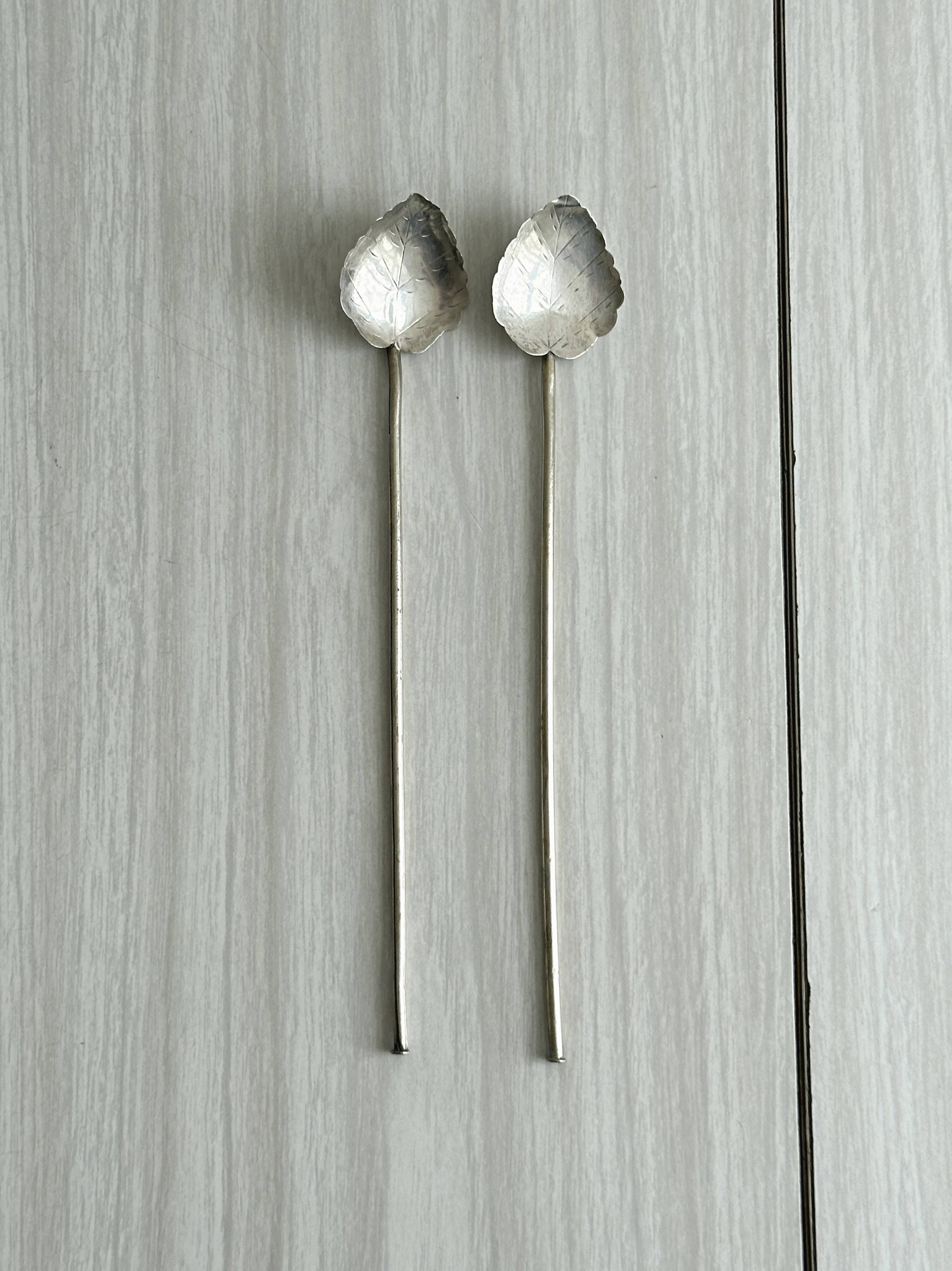 Pair of vintage silver leaf mixers