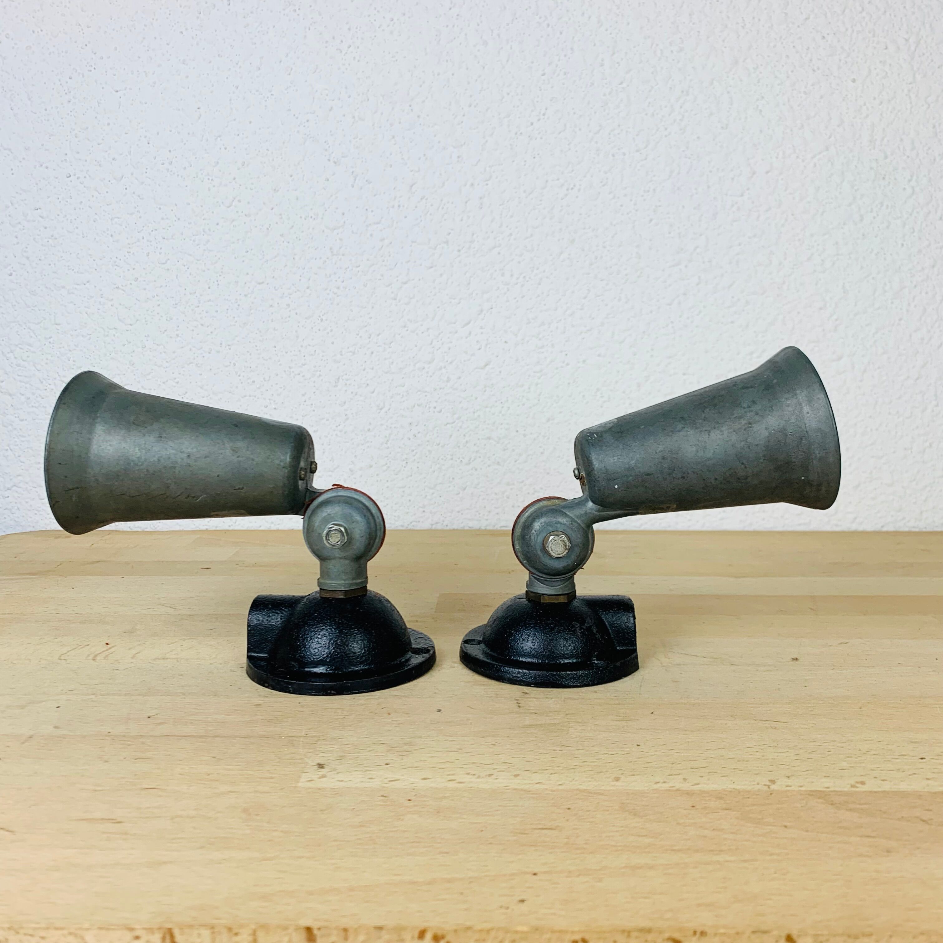 Pair of industrial metal spot wall lights in loft style.