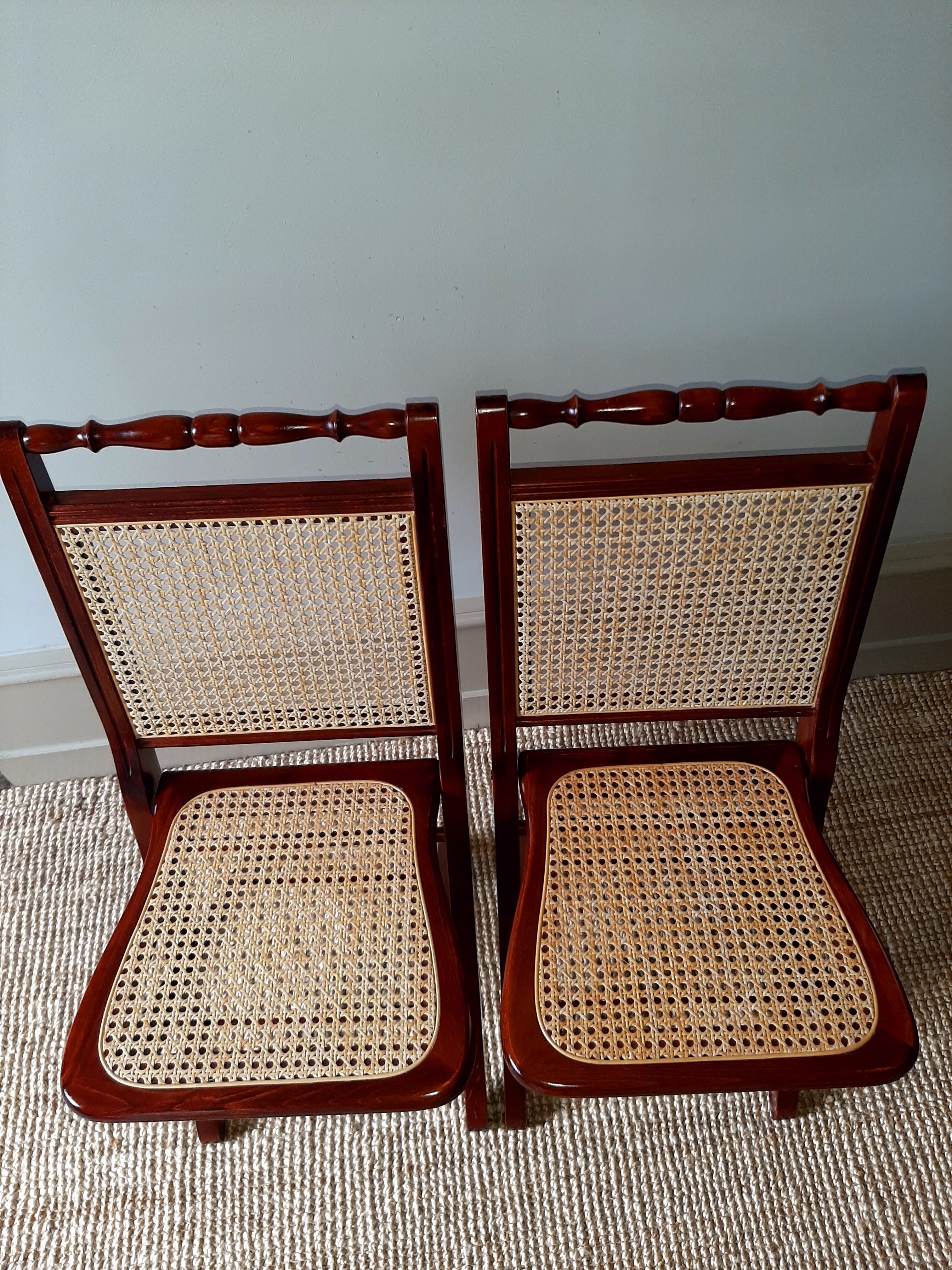 Folding wooden chairs and cannage