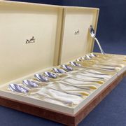 Complete set of 12 Louis XV style mocha spoons in silver-plated metal, Hermès