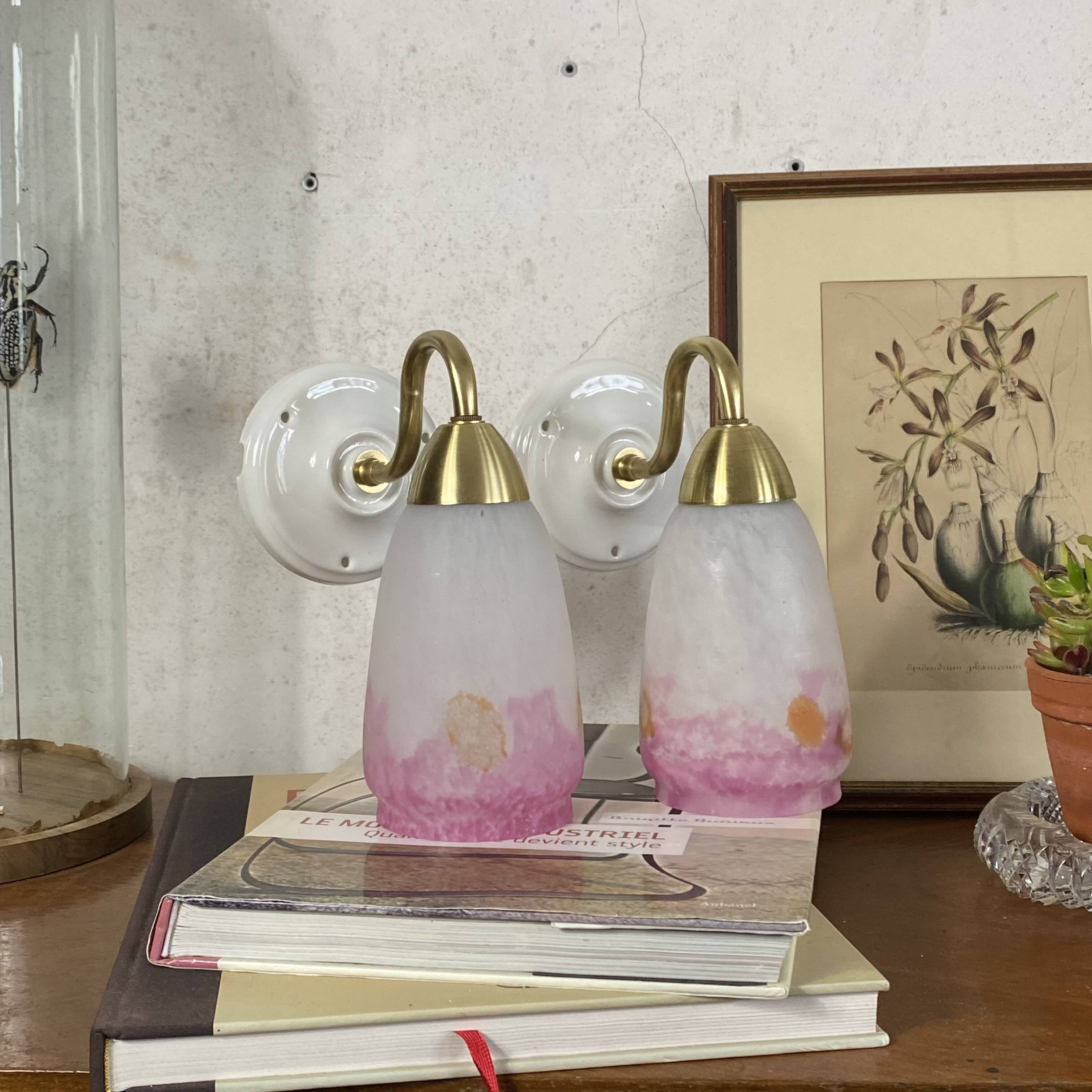Pair of wall sconces in pink glass paste