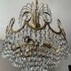 Brass chandelier with crystal pendants from the 1970s.