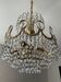 Brass chandelier with crystal pendants from the 1970s.