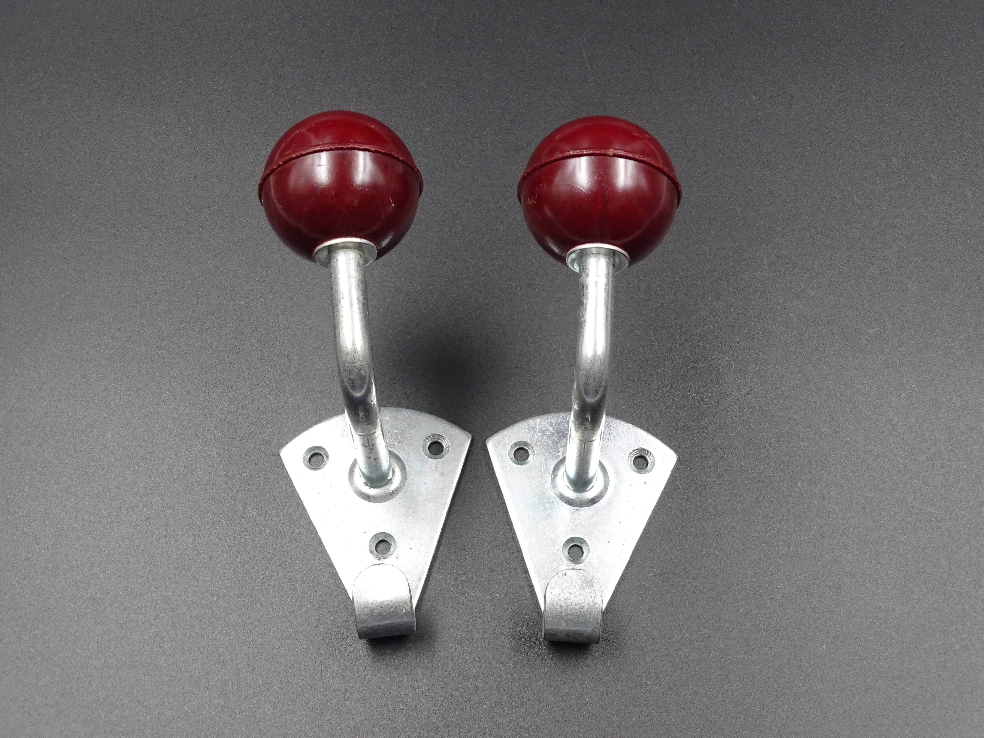 Two hooks in red bakelite and metal - around 1950