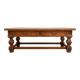 Antique solid wood coffee table with drawers.