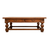 Antique solid wood coffee table with drawers.