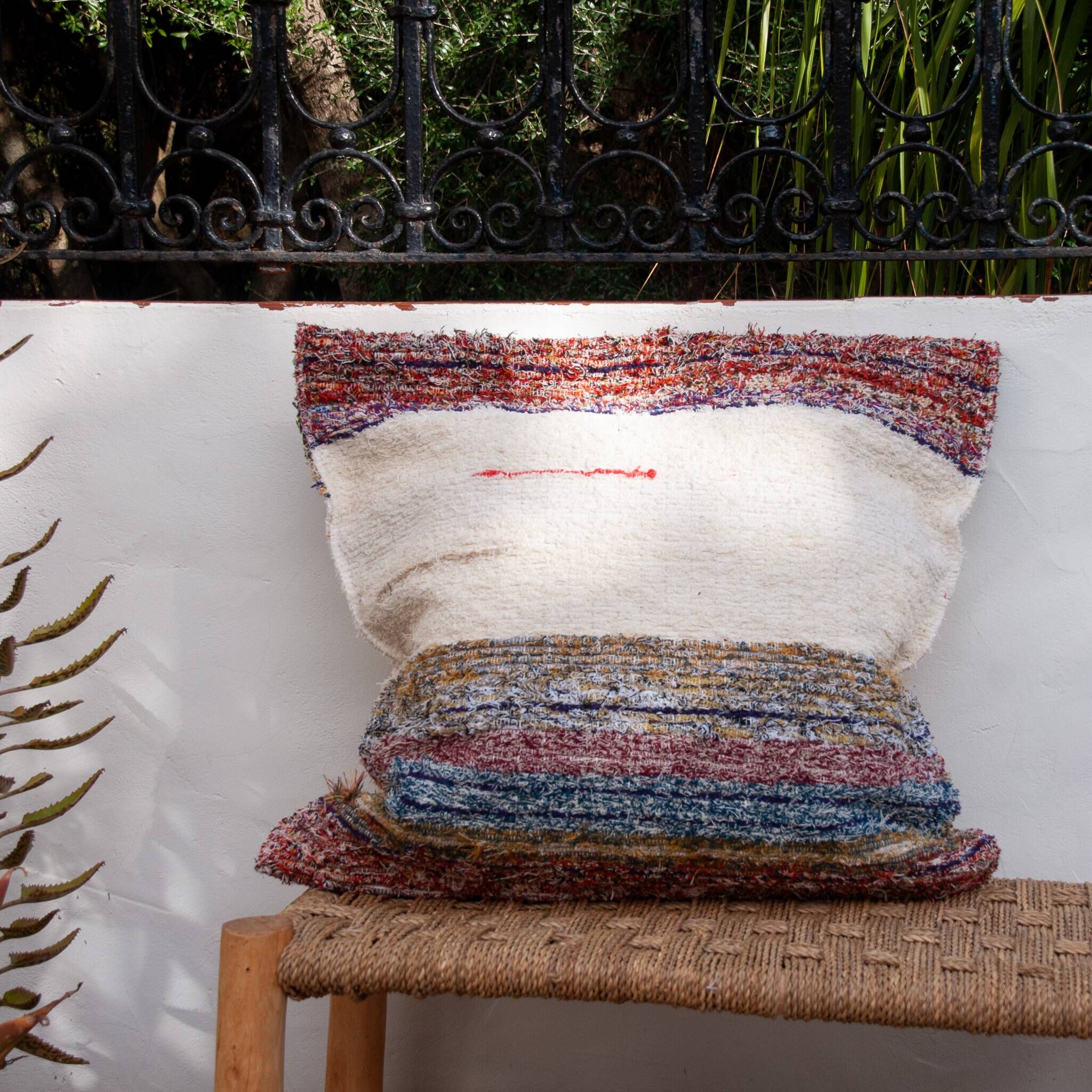 Hand-woven handmade cushion cover made from recycled cotton