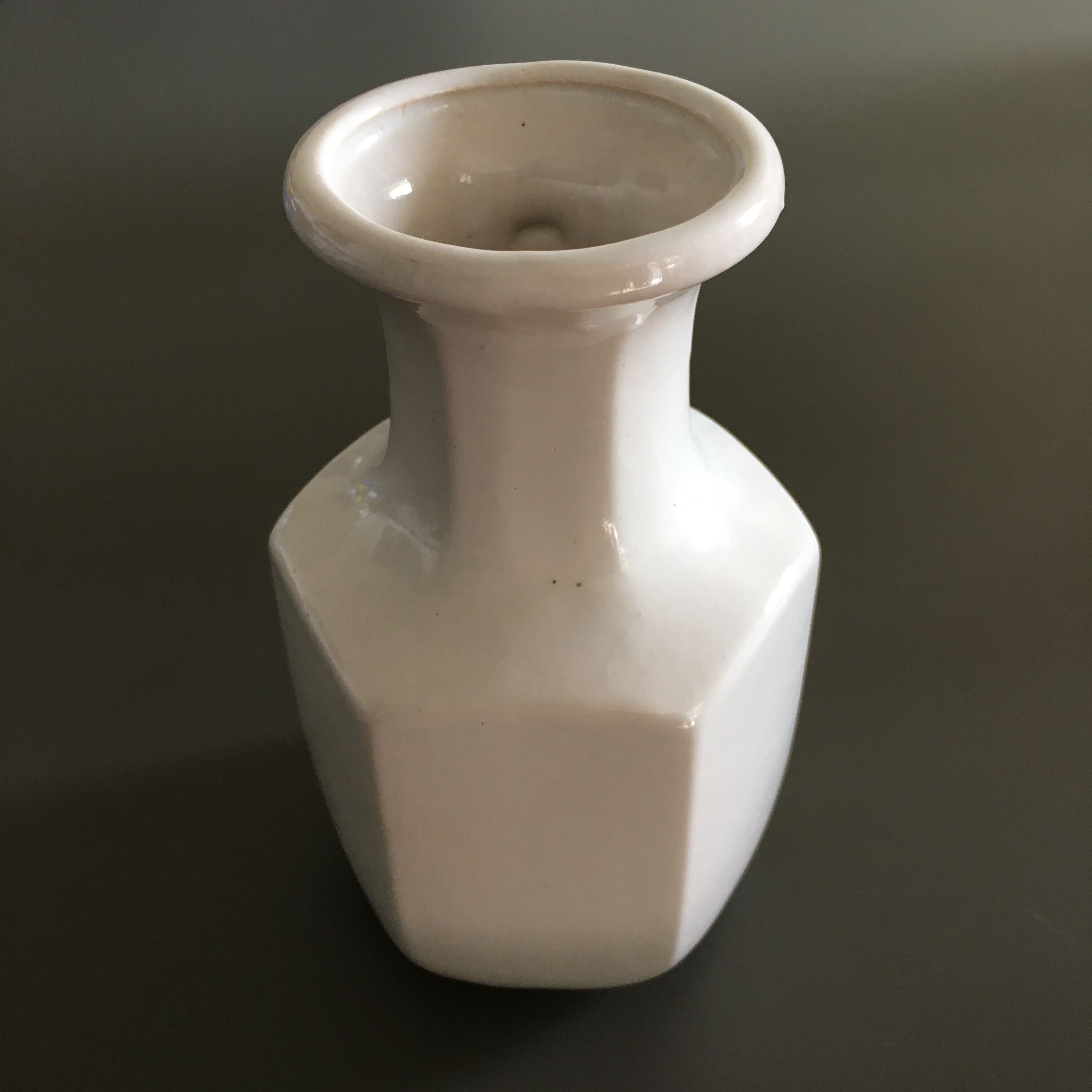 Ivory vase with handle