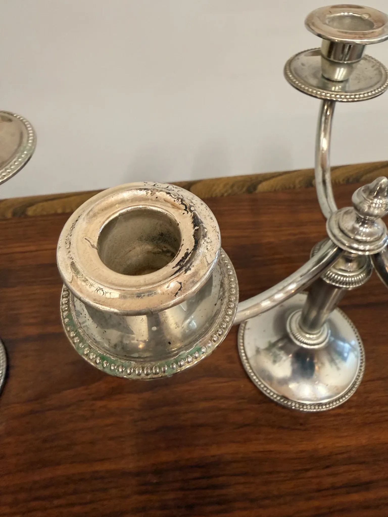 Pair of vintage three-branch silver-plated candlesticks