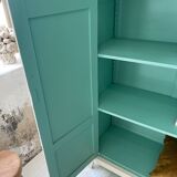 White and green cutter cabinet