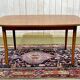 G-Plan teak table from the 1970s with butterfly extension.
