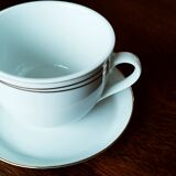 Set of 4 white and gold porcelain cups