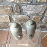 Lot of two old bottles of beige enamelled sandstone bottles