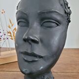 Black ceramic face sculpture