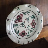 Meyssac plate decorated with flowers on cracked background early twentieth century and its support