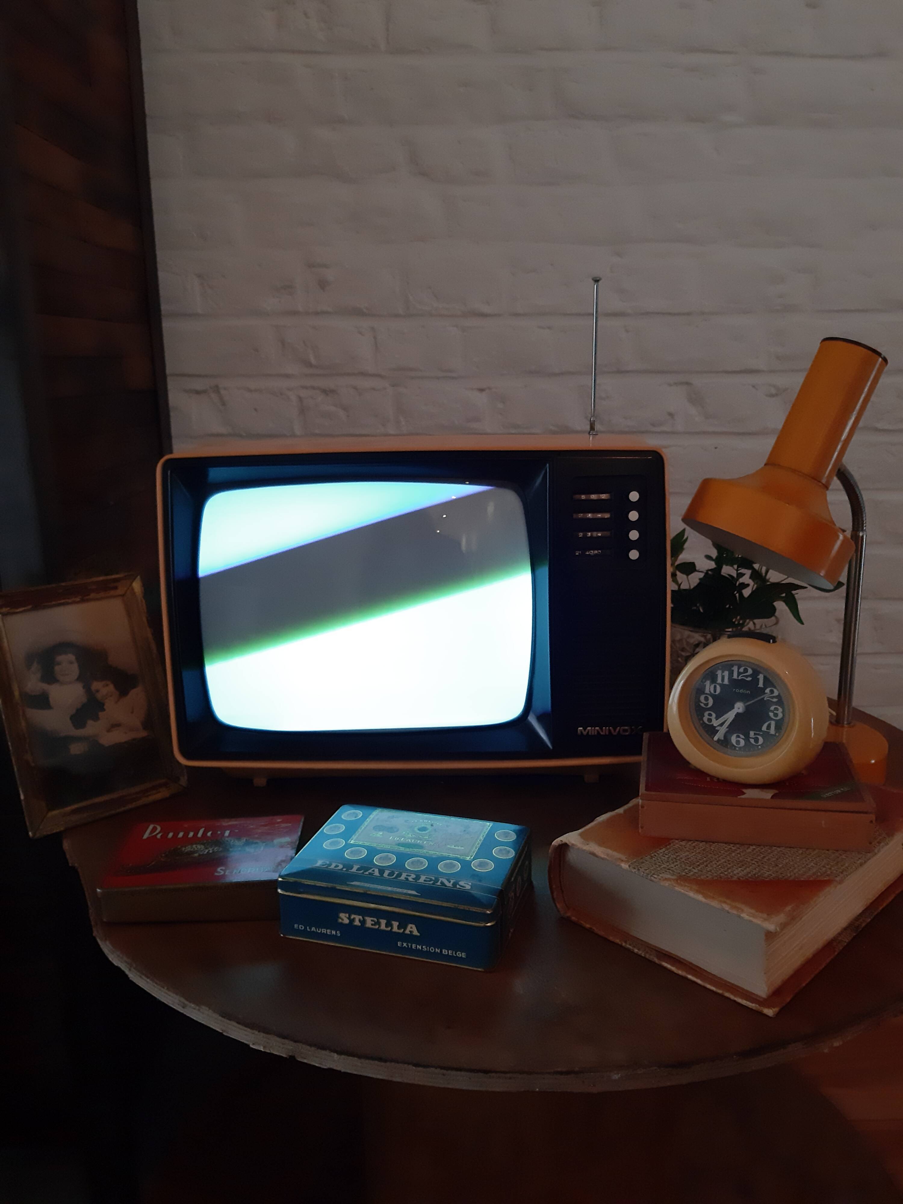 Yellow minivox vintage tv