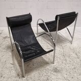 Pair of "Omega" armchairs, chrome-plated metal and leather, Habitat vintage 1980